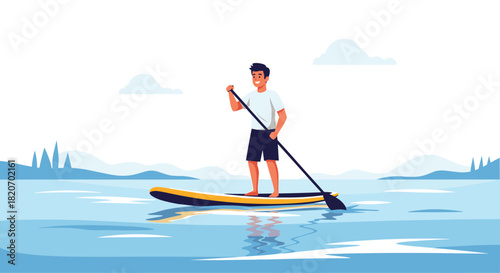 A smiling young man enjoys stand-up paddleboarding on a calm blue lake with a beautiful mountain and forest landscape in the background.