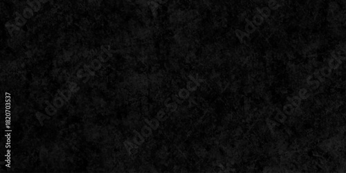 Black dark grunge stone texture with rough, natural wall surface background. uneven pattern resembling weathered black rock or charcoal. Panorama black canvas slate texture. blackboard background.