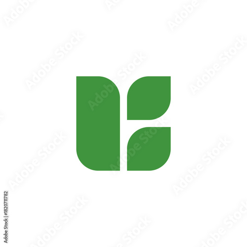 Abstract geometric initial K or R symbol composed of green leaf shapes. A modern vector icon representing nature, growth,ecology, and environmental concepts