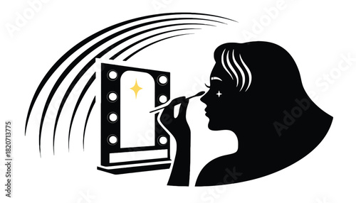 A woman applies makeup in front of a vanity mirror with lights