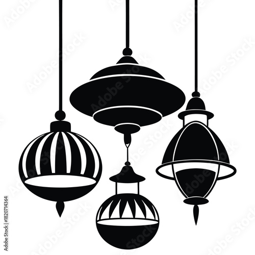 Four ornate lamps hang gracefully in a decorative arrangement, adding ambiance to any space