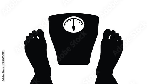 A person stands on a scale with their feet on the edge