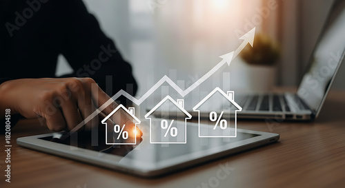 Person using tablet with house percentage icons and upward trend line overlayed on the screen