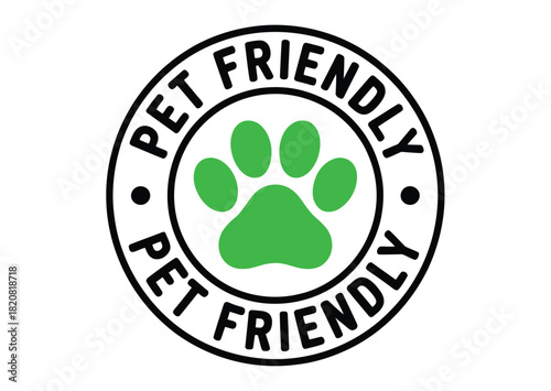 A circular emblem clearly displays the words 'PET FRIENDLY' in bold black lettering surrounding a vibrant green paw print, symbolizing acceptance and welcome for animals in a particular establishment