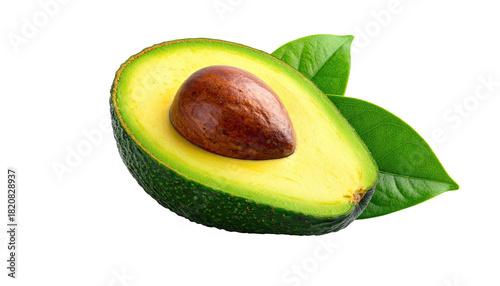 A halved avocado with seed, accompanied by two vibrant green leaves