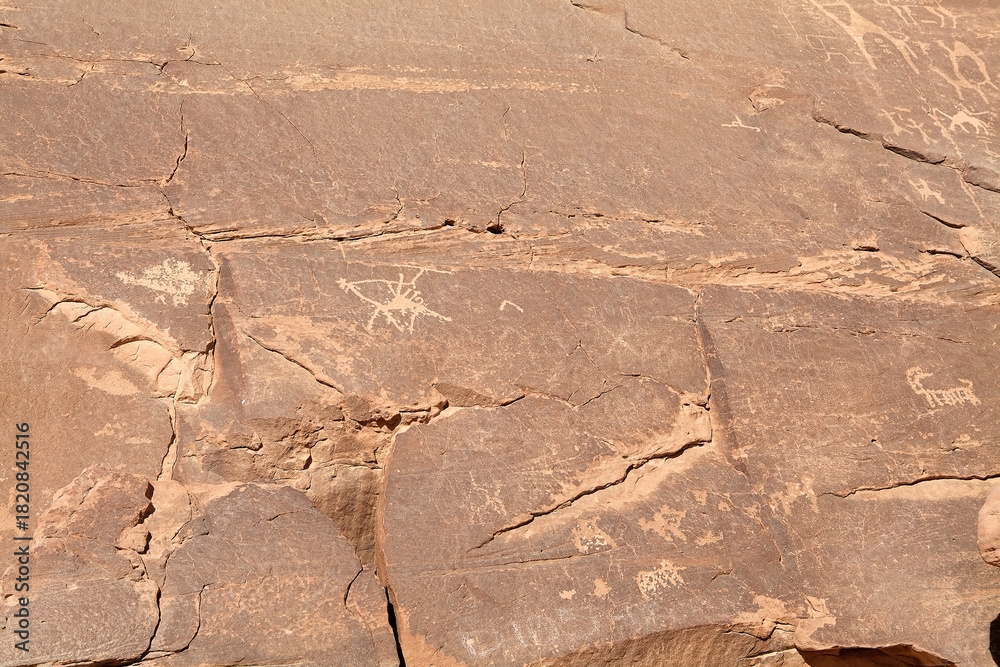 Fototapeta premium Petroglyphs, rock inscriptions, at Wadi Rum, Jordan