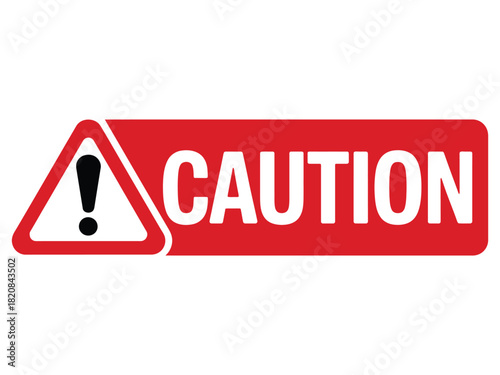 A red rectangular sign with the word "CAUTION" in white letters and a white triangular warning symbol with a black exclamation mark inside is displayed.