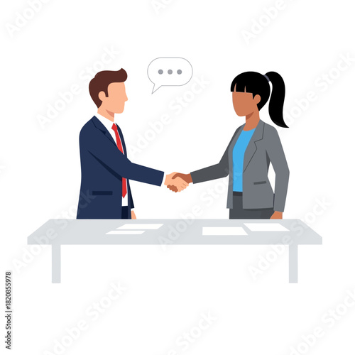 Two people shaking hands over a table, symbolizing agreement and cooperation in business.