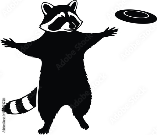 Playful raccoon catching flying disc