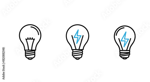 Lightbulbs showing idea development from dim to bright with a lightning bolt on a black studio background