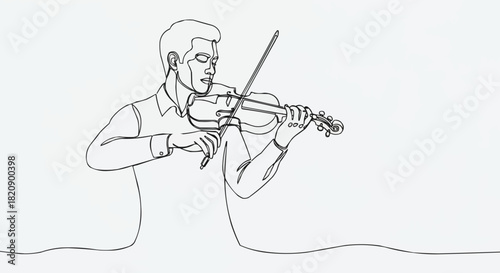 Man playing violin with focus and concentration, musical performance.