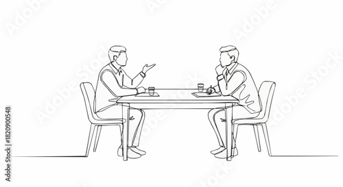 Two men in a meeting discussing ideas over a table.