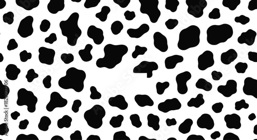 Seamless vector pattern of black and white cow spots creating an abstract animal skin texture for backgrounds and textiles.