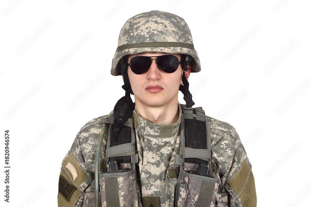 Fototapeta premium A close-up of an American soldier in camouflage uniform, wearing a helmet and black glasses.