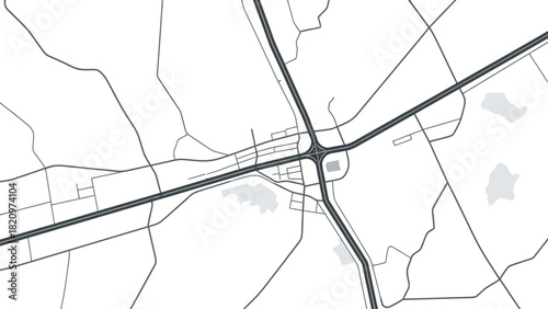 A highway intersection with surrounding roads and shaded areas