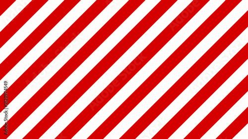Red and white striped background. Classic christmas background with red and white diagonal stripes in a candy cane style.