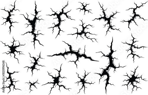 Set of black cracks on a surface, broken ground or wall effects Vector illustration