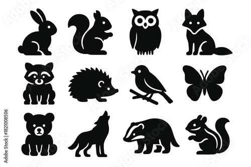 Woodland Wildlife Icons. Solid style icons of Woodland Wildlife: rabbit, squirrel, owl, fox, raccoon, hedgehog, bird on branch,