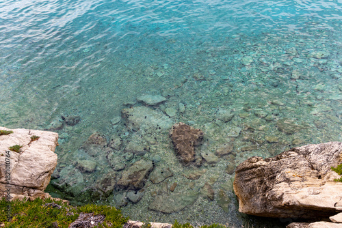 Fototapeta Naklejka Na Ścianę i Meble -  Coastline with rocky beach. Croatia, Makarska. Drone view, aerial photo.