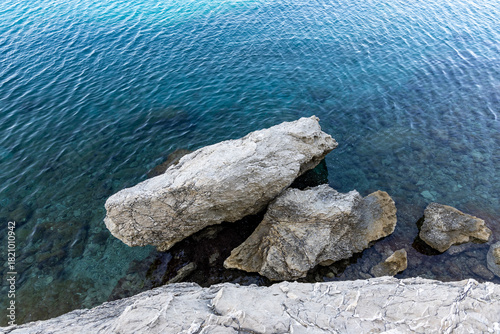 Fototapeta Naklejka Na Ścianę i Meble -  Coastline with rocky beach. Croatia, Makarska. Drone view, aerial photo.