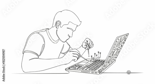 Man carefully repairs laptop computer with precision tools and focus.