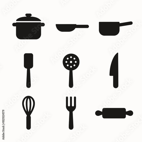 Set of nine black silhouette kitchen utensils on white background