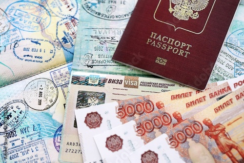 Photography Fragment of Russian Federation visa in passport page and russian money close up