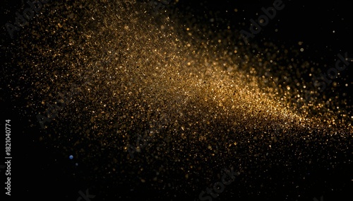 Sweeping gold dust cloud moving across black backdrop, with glitter bokeh tiny specks and warm beam