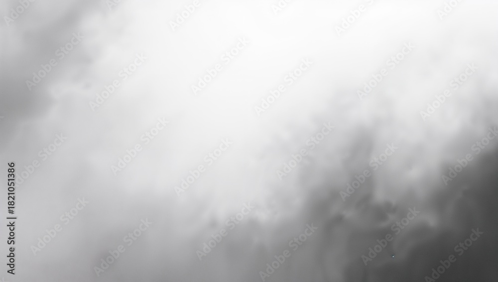 Naklejka premium Filling frame dense cloud layers forming monochrome sky, luminous center, shadowed lower-right