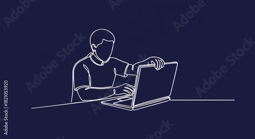 Person working on a laptop computer, focused and concentrated on the task at hand.