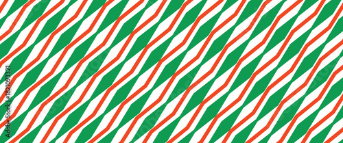 Christmas seamless pattern. Red and green diagonal stripes background. Candy cane repeating decoration wallpaper. Winter holiday lines backdrop. Xmas peppermint present wrapping print design. Vector