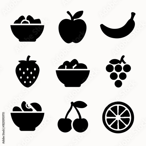 Collection of black silhouette fruit icons including apple, banana, grape, and cherry