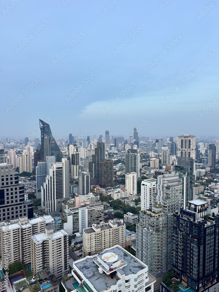 Fototapeta premium View of bangkok thailand south east asia city skyline tall big skyscrapers buildings dusk sunset