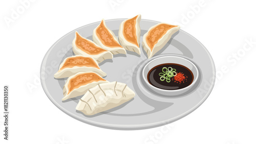 A plate of panfried dumplings with a dipping sauce