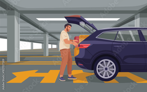 Man loading boxes into the back of a car in a parking garage