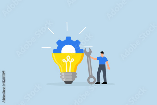 Innovation development, businessman build gear in lightbulb idea.