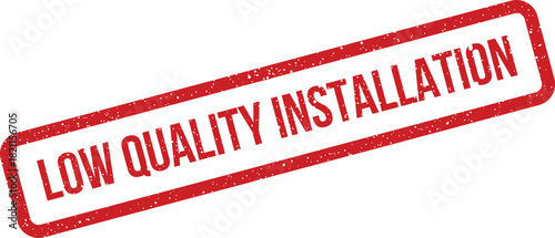 Distressed red rubber stamp impression showing LOW QUALITY INSTALLATION text, suggesting assembly or setup issues