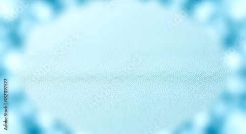 Close up of a light blue oval pill or tablet with a score line in the center