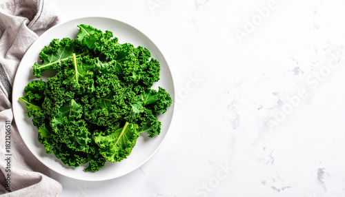 Kale salad plate on white background Superfood Minimal Food styling Top view copy space