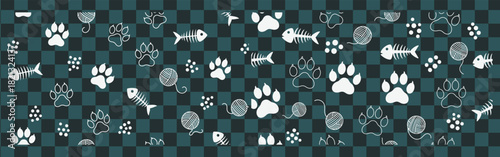 Whimsical cat themed pattern featuring paw prints yarn balls and fish bones on a checkered background
