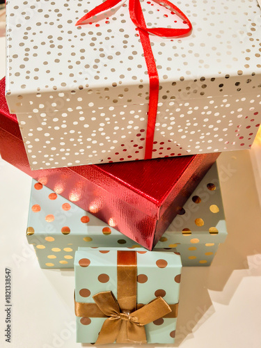 Christmas gifts, bright boxes with ribbons.