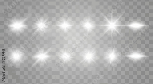 Collection of sparkling white lens flares on a transparent background for design