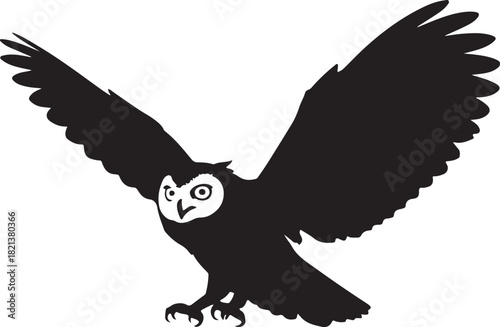 Silhouette of an Owl in Flight