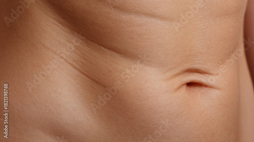 Wallpaper Mural Abdomen Illuminated by Strong Side Light Showcasing Skin Texture and Natural Crease Folds During an Afternoon Close-Up Session Torontodigital.ca