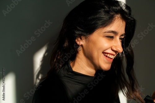Smiling woman in natural sunlight portrait