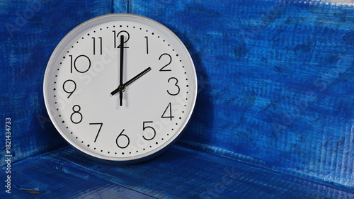 Wallpaper Mural Time change in autumn and spring, hours 2. Copy space with blue background. Torontodigital.ca