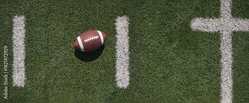 Overhead view of American football on playing field