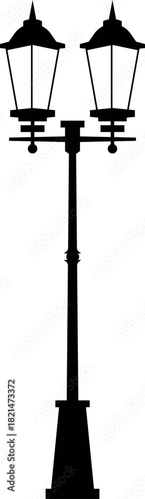 Fototapeta premium A tall black pole with two lamps on top