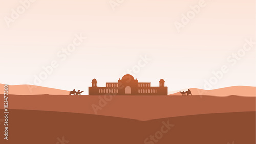 Silhouette of a building in the desert with camels