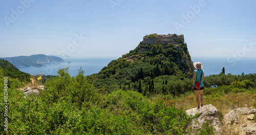 Female tourist looking at Angelo Castro fortress from viewpoint